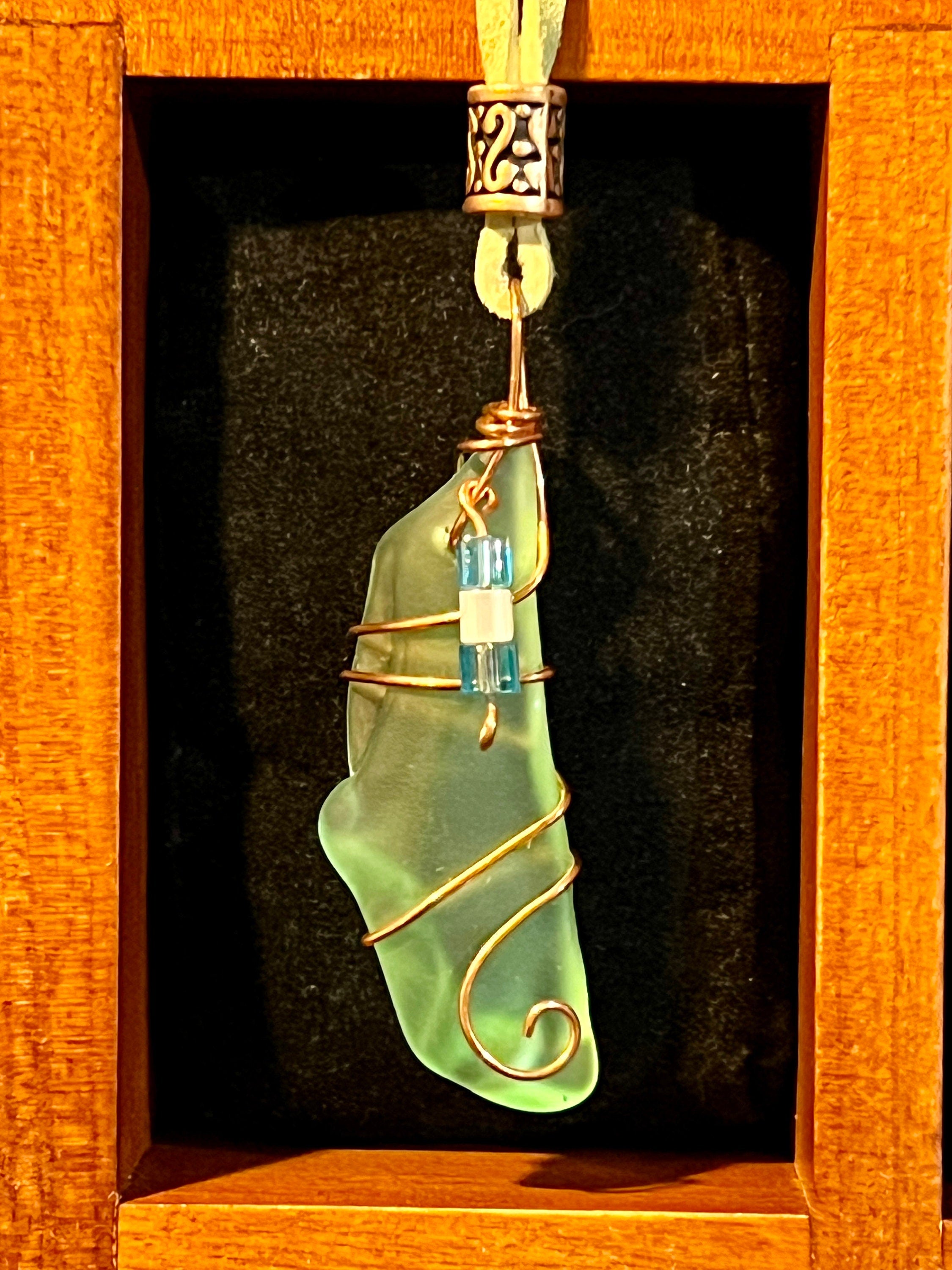 Light Green Sea Glass Pendant Wrapped In Copper Wire