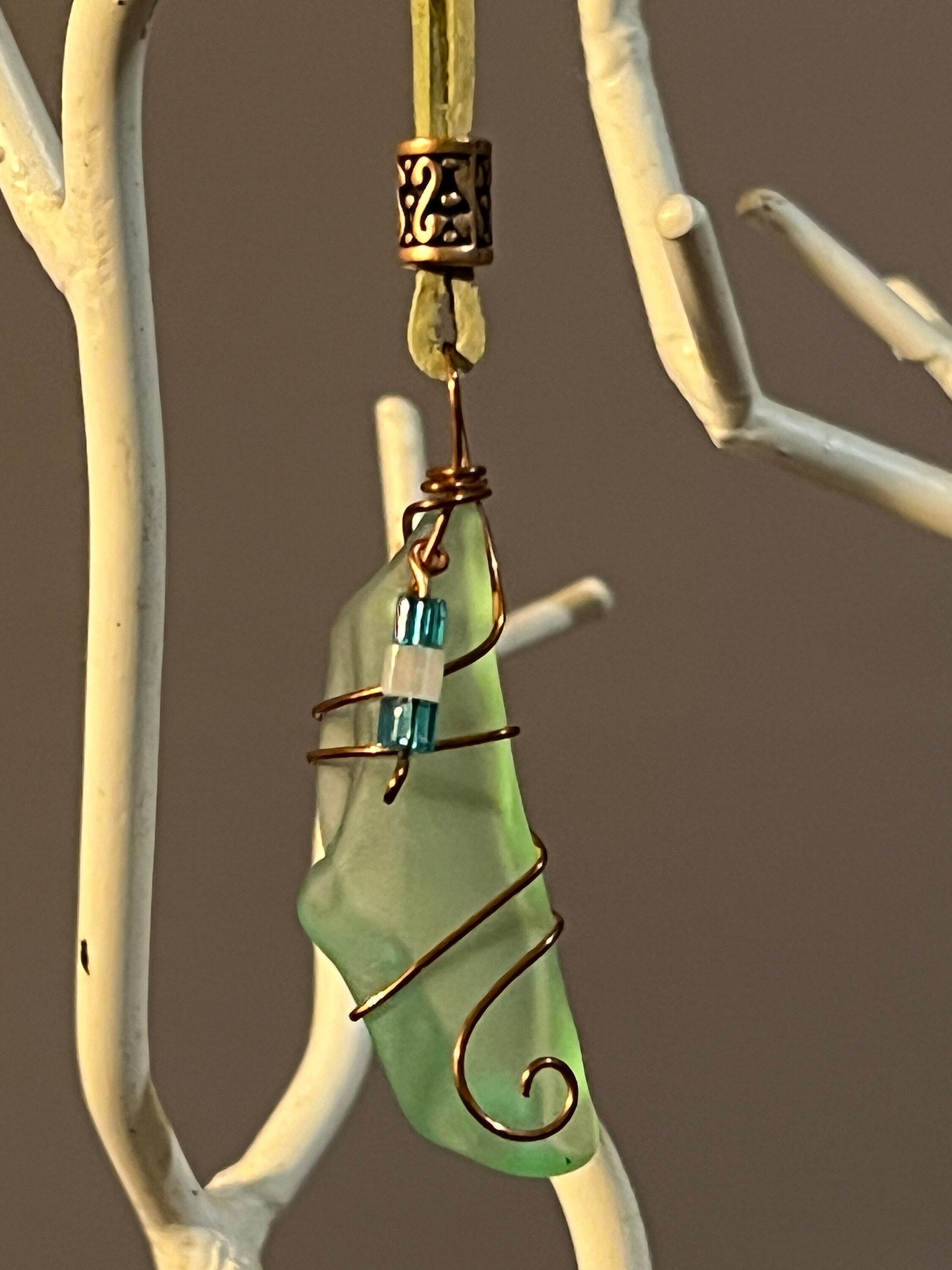 Light Green Sea Glass Pendant Wrapped In Copper Wire