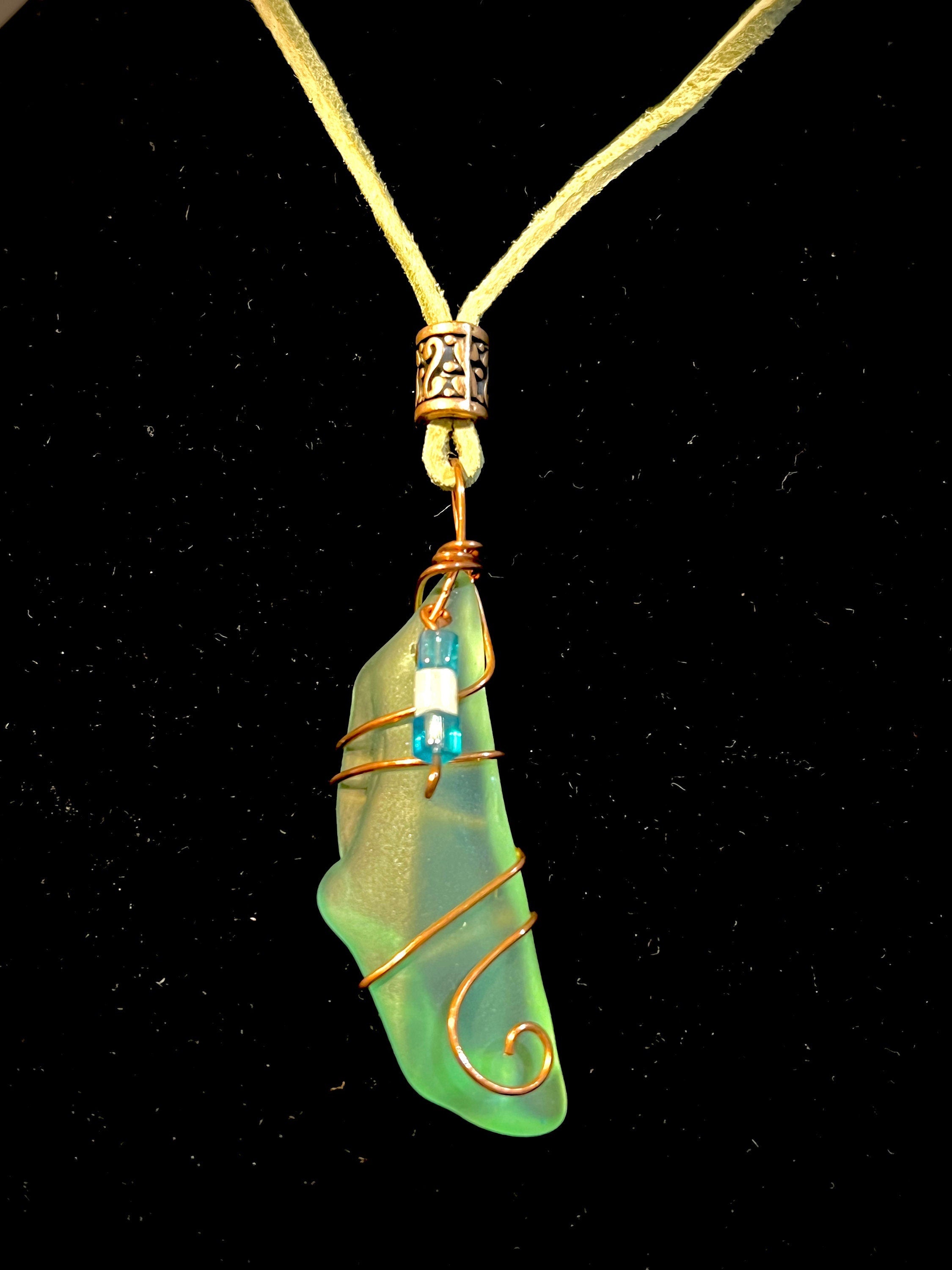 Light Green Sea Glass Pendant Wrapped In Copper Wire